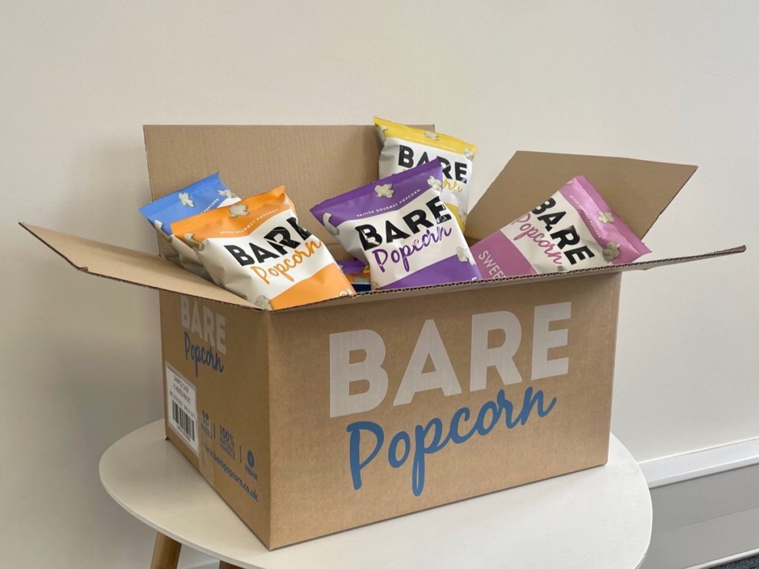 Cardboard box filled with snack packets