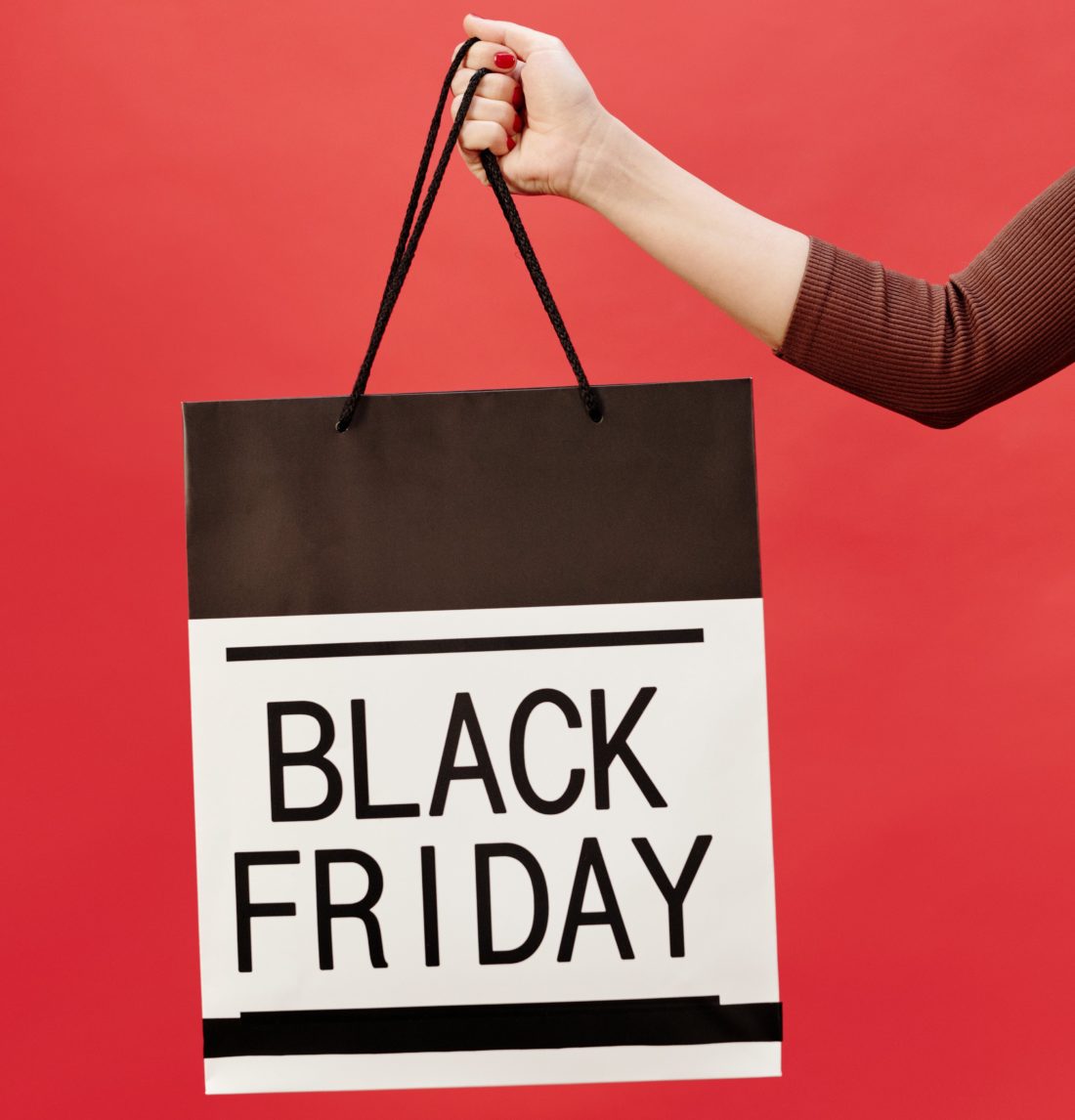 Bag-with-Black-Friday-text-being-held-in-the-air