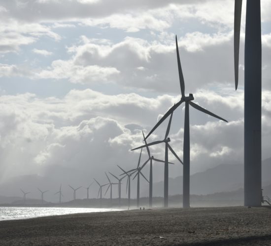 wind-turbines-against-a-cloudy-sky-produce-renewable-energy-carbon-offset