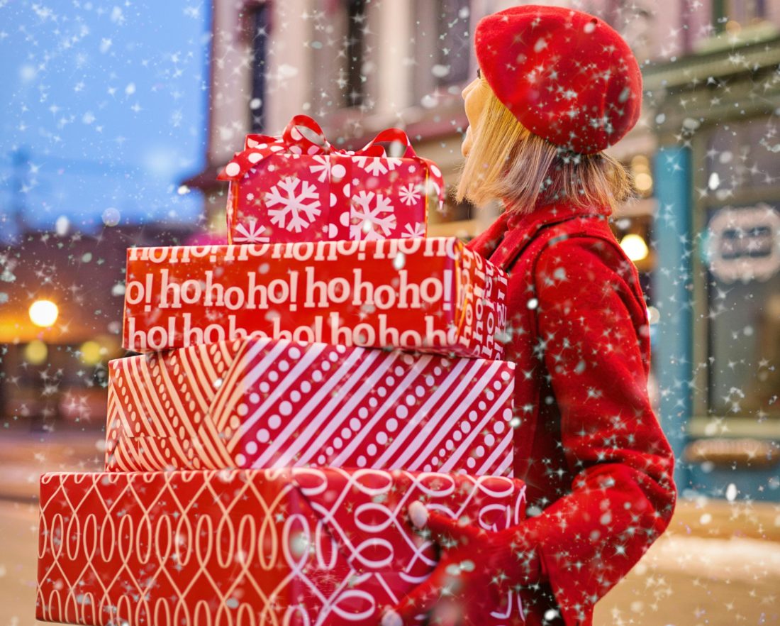 christmas-gifts-held-by-lady-dressed-in-red