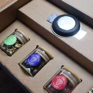 Bespoke-tea-box-with-tea-jars-and-strainer